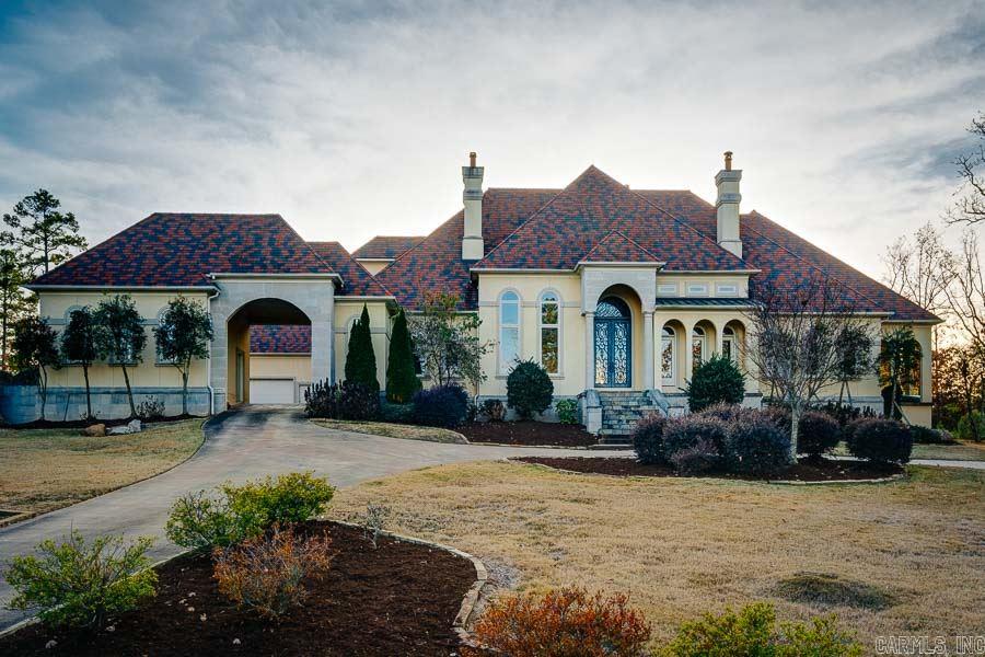 Exclusive estate on over 5 acres with breathtaking views of Lake Maumelle & river valley. Custom built w/ beautiful finishes & attention to detail. Superb quality throughout. Wonderful indoor & outdoor spaces perfect for living & entertaining. Gourmet kitchen w/ hearth room,4 living areas,media room. 2 BR's down, 3 up. Luxury master suite with fireplace, exercise room & walk in closet/dressing room. 3 covered patios affording beautiful views. Salt water pool. Way too many features to list. See docs for list