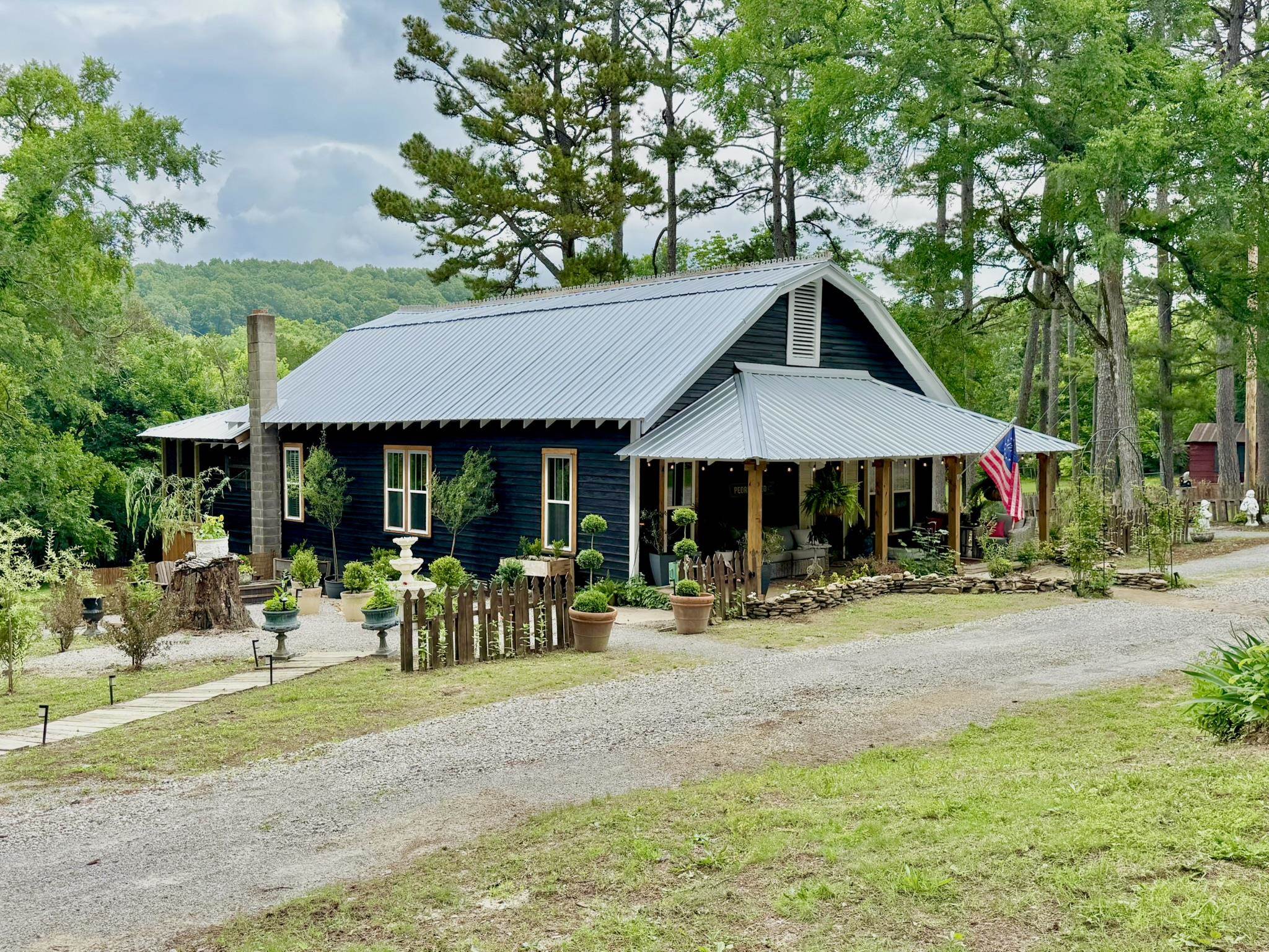 Completely Remodeled Home with Guest House on 5.51 Acres in Melbourne! The main home has a spacious living area with 9ft. ceilings, a cozy gas fireplace, and a uniquely designed kitchen full of character. You'll find generously sized bedrooms, including a relaxing primary suite with an attached private bathroom. Step out back to a large screened-in porch overlooking the peaceful, well-maintained property—perfect for morning coffee or evening sunsets. The guest house offers a bright, open-concept layout with 2 bedrooms and 1 full bathroom—ideal for extended family, visitors, or even rental potential. The outdoor space is a dream! Enjoy lush landscaping, raised garden beds, a greenhouse for year-round growing, a storage shed, a shop for hobbies or equipment, and a storm shelter. Guest home comes FULLY FURNISHED! Main Home furnishings are negotiable! Arkansas Homestead in a fantastic location!