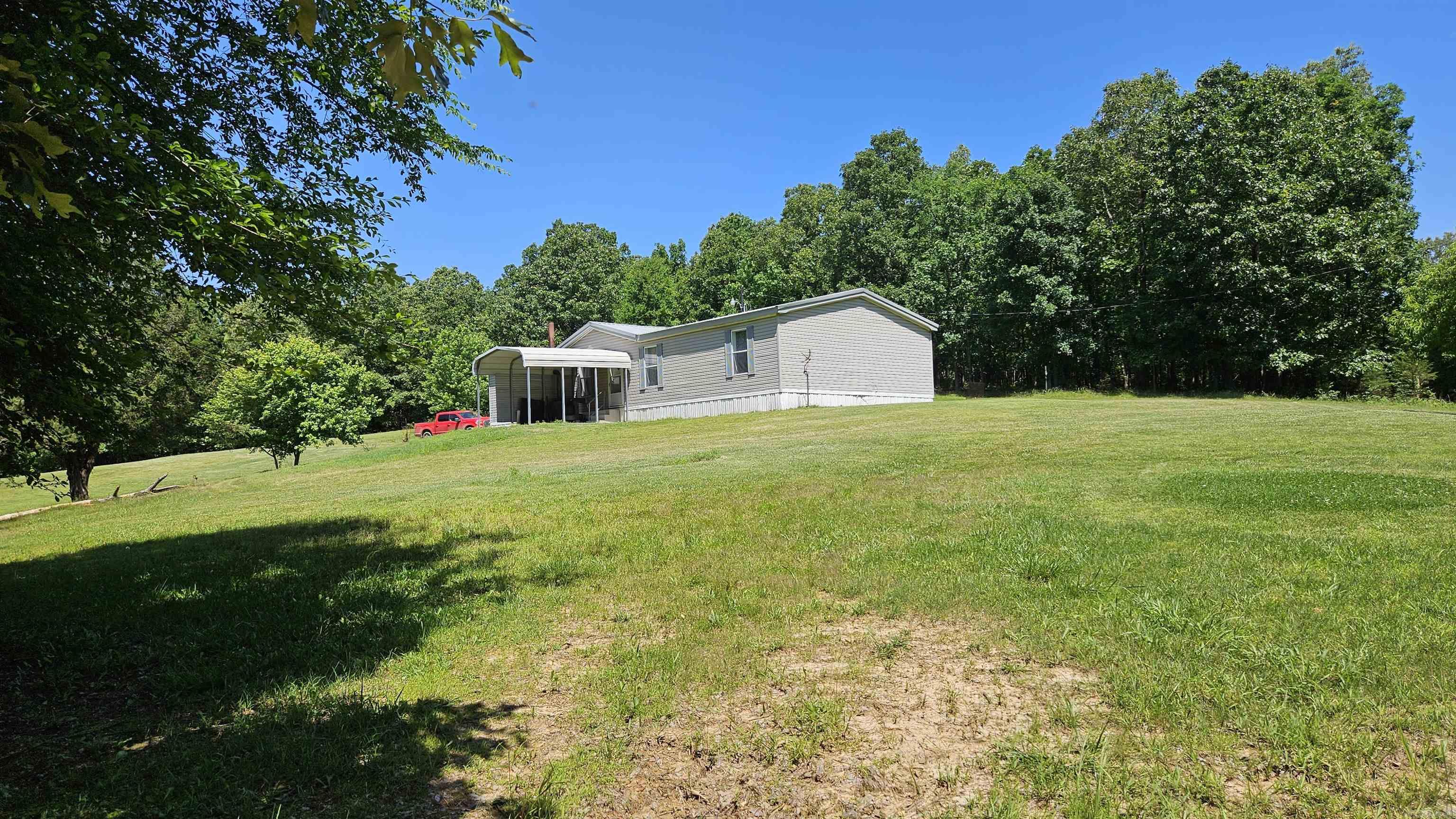Coming Soon 3 bedroom 2 bath home on 40 acres. Mostly wooded. property has a metal hog barn, 3 storage buildings and one carport. Home is located on the hill over looking most of the property , has a large fish pond in the bottom of the valley. Has older fencing on most of perimeter of property . excellent hunting Property for deer , turkey, squirrel and rabbits.