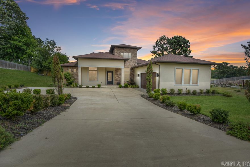 Welcome to this sleek, modern, and contemporary one-story home located in a prestigious gated community. As you step inside, you'll be greeted by the impressive tall ceilings in the formal dining area, creating an open and spacious atmosphere. The kitchen is a true culinary haven, boasting a gas stove for precise cooking, a convenient breakfast nook, and an open layout that seamlessly connects to the centrally located family room. This design promotes a sense of togetherness and makes entertaining a breeze. Furthermore, the family room features a cozy gas fireplace, perfect for creating a warm and inviting ambiance. For those who enjoy outdoor living, you'll be delighted by the spacious covered patio, which includes a convenient gas hook up for your grill. This area is ideal for hosting summer barbecues or simply relaxing while enjoying the fresh air. The split floorplan offers privacy and convenience, with a generously proportioned master suite featuring a tray ceiling. The master bathroom is a tranquil retreat, complete with a luxurious soaking tub, a walk-in shower, and a double sink vanity. Every detail has been considered to create an oasis of relaxation.