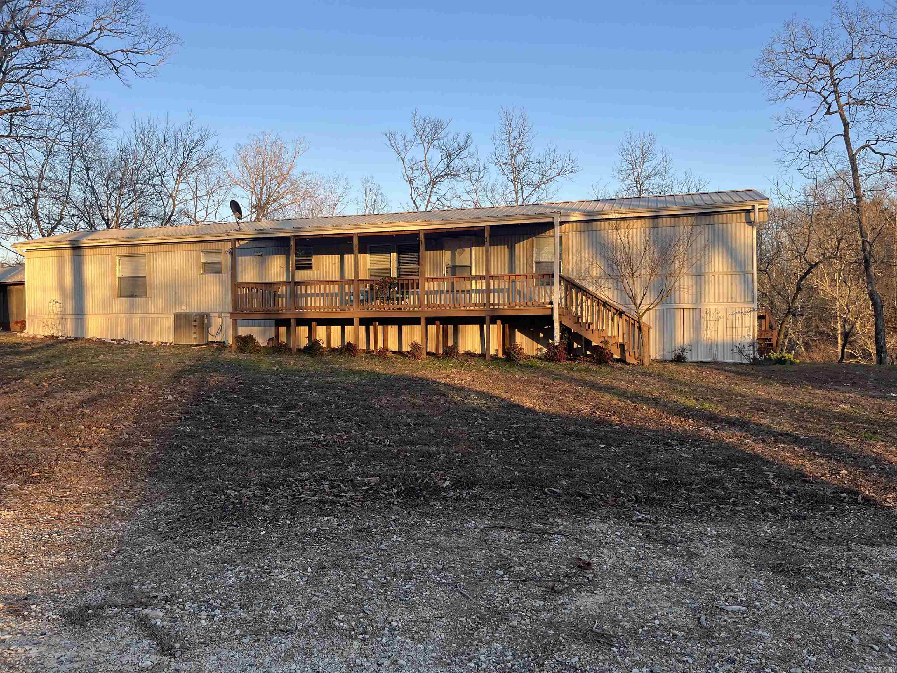 Lakefront living at its best! This charming fully furnished home sits right on the lake, offering water views and direct access for fishing, boating, or simply relaxing. Move-in ready, this home comes with everything you need— Enjoy peaceful mornings on the deck with a cup of coffee. Featuring 3 bedrooms and 2 baths, this home is perfect for a weekend getaway or full-time lakefront living. Don't miss this rare opportunity to own an affordable, fully furnished retreat—schedule your showing today!"
