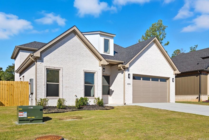 6825 Rudolph Rd in Alexander is a bright, airy, and modern new construction that perfectly blends style with comfort. The open layout, large windows, and clean design give the home a light and spacious feel throughout. The kitchen is a true showpiece with sleek cabinetry, gold accents, and plenty of workspace for cooking or entertaining. Step outside to a quiet backyard and covered patio—perfect for soaking up the crisp fall weather or enjoying a relaxing evening at home. Conveniently located with quick access to both Little Rock and Bryant, this home offers a peaceful setting without sacrificing proximity to shopping, dining, and commuting routes. Modern, inviting, and thoughtfully designed—this one’s ready to welcome you home.