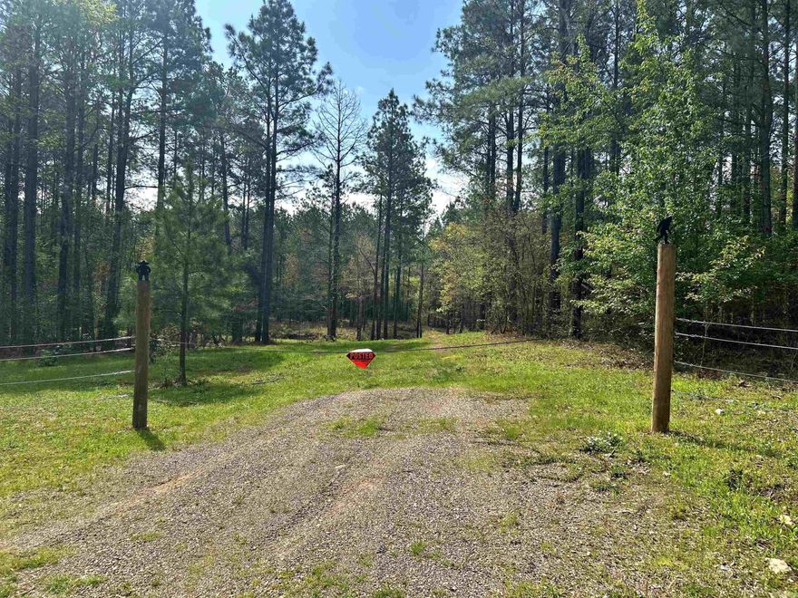 This 10 +/- acre property with Caney Creek flowing through is a must see. Has been clear cut and mulched ready to build your dream home or replant and have as an investment. New culvert at the entrance, new Cypress trees and Ozark Chinquapins planted.  This is a breathe taking place. Located 30 minutes form SWAHA Marina on Lake Greeson, 11 miles northeast of Murfreesboro and is accessible by Shawmut Road. No utilities on the property. Nearest about 2.5 miles away. Parcel #240-00002-000