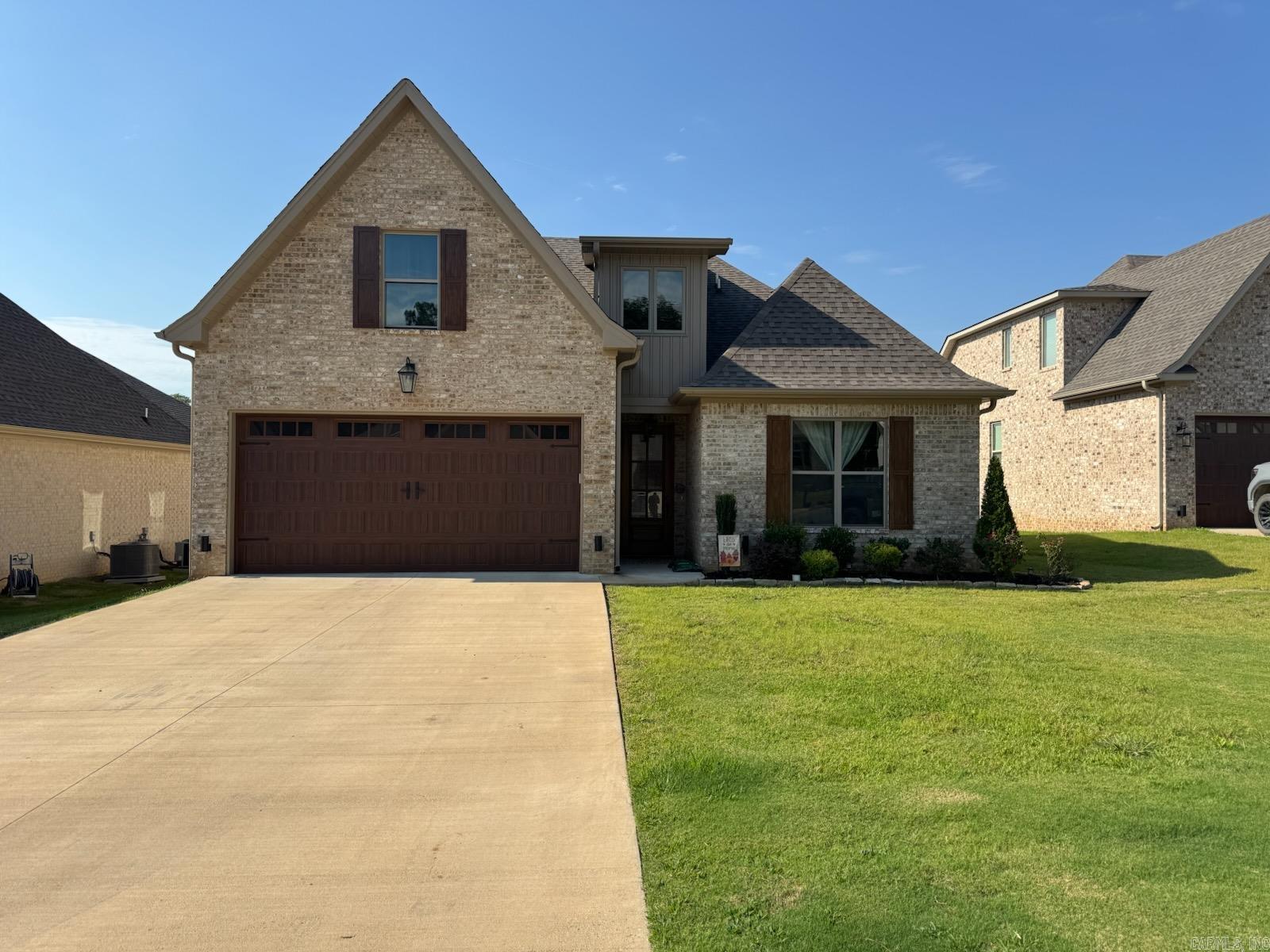 Built in equity makes this opportunity stand-out! Listed below appraisal, this 4-bedroom, 3-full-bath home with a bonus room offers 2,579 square feet on a cul-de-sac in The Landing at Hudson, a gated community. It already includes a fenced backyard and screened-in porch, upgrades many neighbors have added later at their own expense. The main-level primary suite features a spa-style bath, while the open-concept kitchen offers a gas range, center island, and stainless appliances flowing into the living room with a gas-log fireplace. Upstairs, the bonus room with full bath provides flexible living space that could be perfect for another bedroom, home office or media room. Enjoy year-round outdoor living on the screened porch with fireplace, all complemented by a 2-car garage and in prime gated community location close to ASU, the Farmer's Market and all that Greensborough Village has to offer.