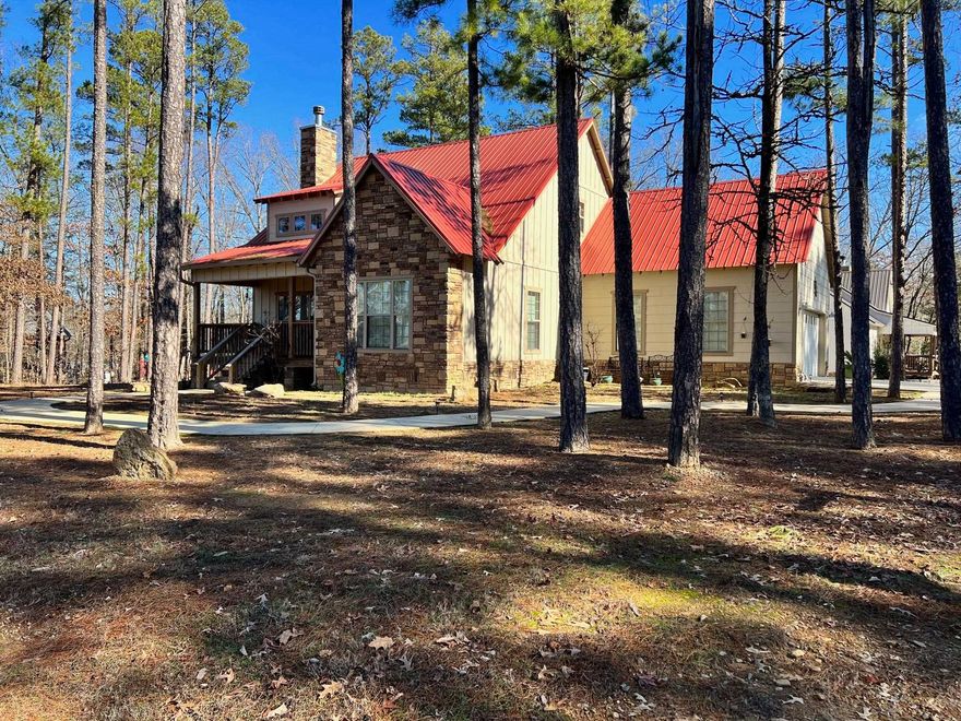 Beautiful home in a peaceful setting offers great space for enteraining family and friends including a large covered back deck for grilling and a hot tub. Access to fishing on the Little Red River with a community boat dock. Less than 15 minutes from Greers Ferry Lake, this one has it all and it is being sold with furniture and has great VRBO history. Make it your home today or your next investment!