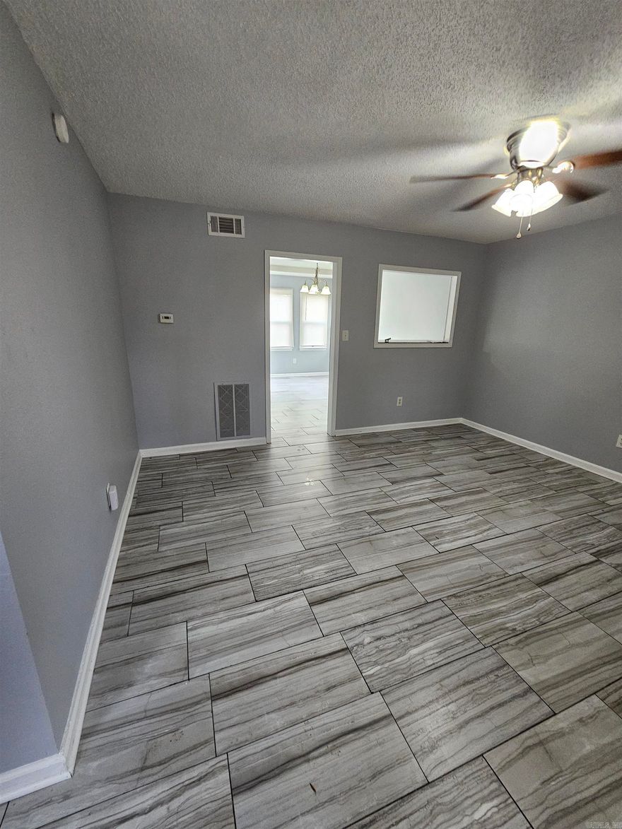 Welcome to 39 Wright Cir in Jacksonville, AR! This charming 4-bedroom, 1.5-bathroom home offers a fully fenced-in backyard, perfect for pets to roam freely. The attached garage provides convenient parking and extra storage space. Enjoy the outdoors on the back porch, ideal for relaxing or entertaining guests. Say goodbye to lawn maintenance as lawncare is included with this rental. Plus, with pets allowed, your furry friends are welcome to join you in your new home. Call to set up a private showing at 501-539-2325