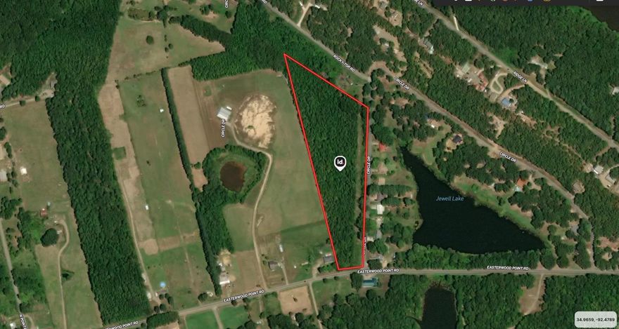 Level 8 acres with city water and electric available. Has a nice building site with mature trees. Private setting Will need a septic tank installed