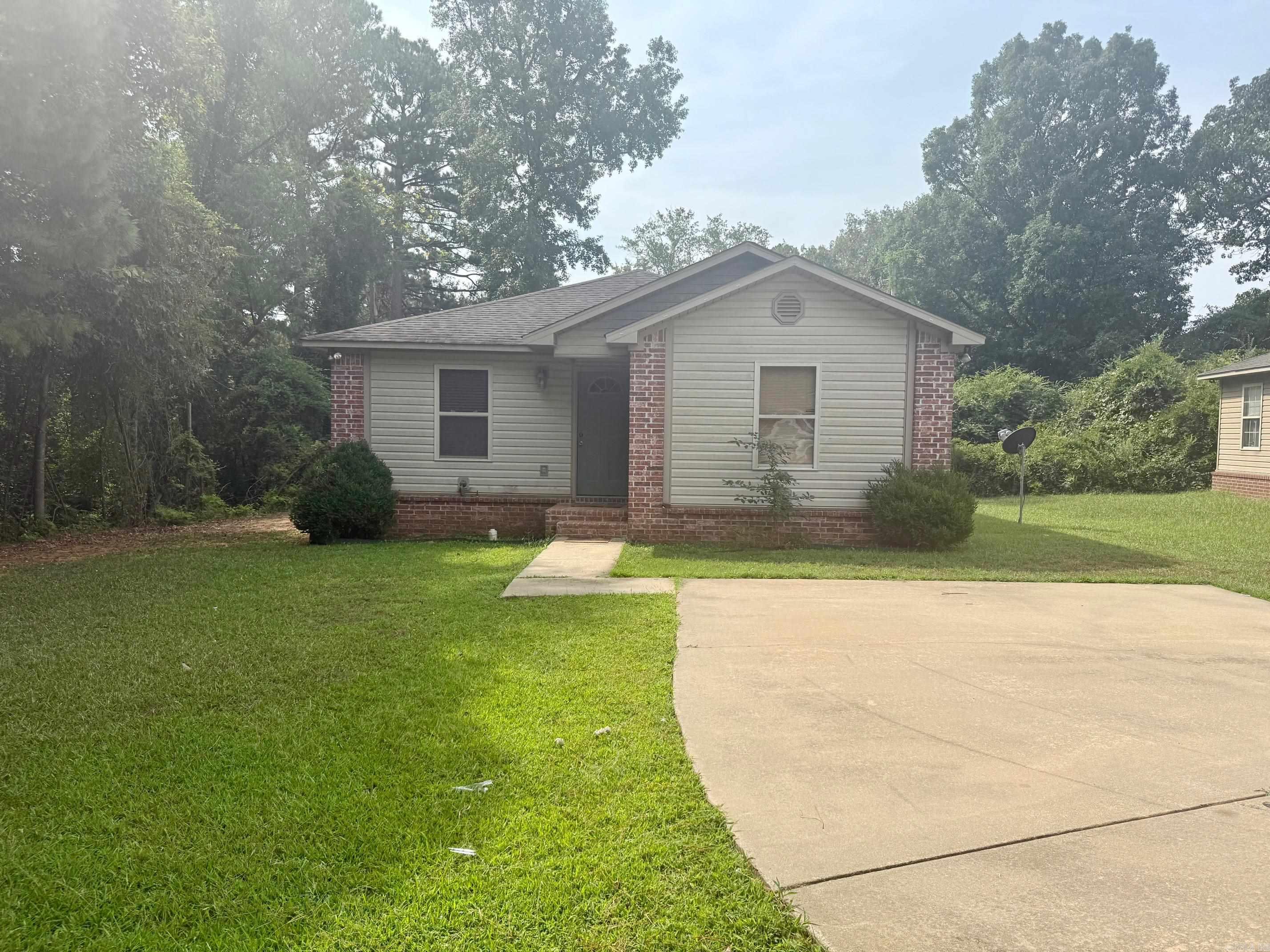 Welcome to this charming 3-bedroom, 2-bathroom home located in the heart of Sheridan, AR. This property boasts a super cute aesthetic that is sure to captivate you. The interior is currently being prepared for its grand reveal, with pictures coming soon. The neighborhood is peaceful and inviting, offering a serene environment that complements the charm of the house. This home is perfect for those who appreciate a blend of comfort, style, and convenience. Don't miss out on the opportunity to make this delightful property your new home.