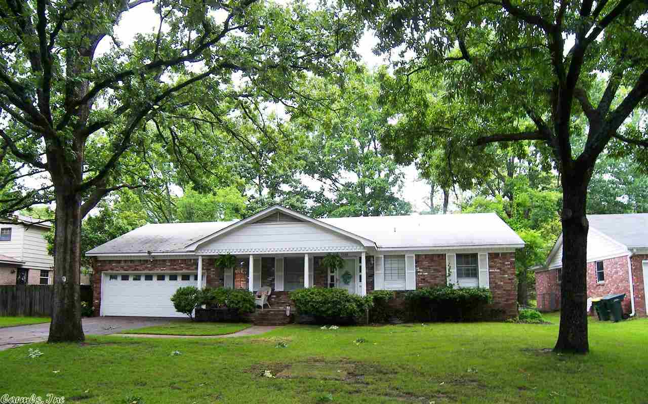 Awesome one level in mid town. Two car garage. Flat lot. Beautiful redone hardwood floors in living room and bedrooms. two living spaces. spacious bedrooms. this home is a must see!!!
