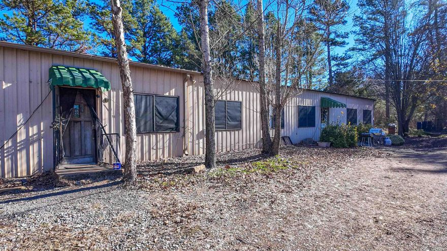 CALLING ALL INVESTORS—this is a rare opportunity to acquire a duplex with acreage and expansion potential. Located at 3809 Batesville Blvd, Batesville, Arkansas, this approximately 3,200 sq ft duplex sits on 4.42 M/L acres, offering space for future POTENTIAL development such as additional apartments, tiny homes, or other investment properties. The front-facing unit features 3 bedrooms and 1.5 baths, an updated kitchen, and comes furnished with a microwave, stove, and refrigerator. This unit is currently leased at $795 per month, with room to enhance performance. *Please note that the first unit interior pictures reflect before it was rented.* The second unit offers 2 bedrooms and 1 bath, a functional newer kitchen, and newer flooring completed in recent years. It is currently leased at $650 per month, with room to enhance performance Duplex properties with this amount of land are rarely available, making this a strong option for investors looking to expand or diversify their portfolio. Call today for a showing!