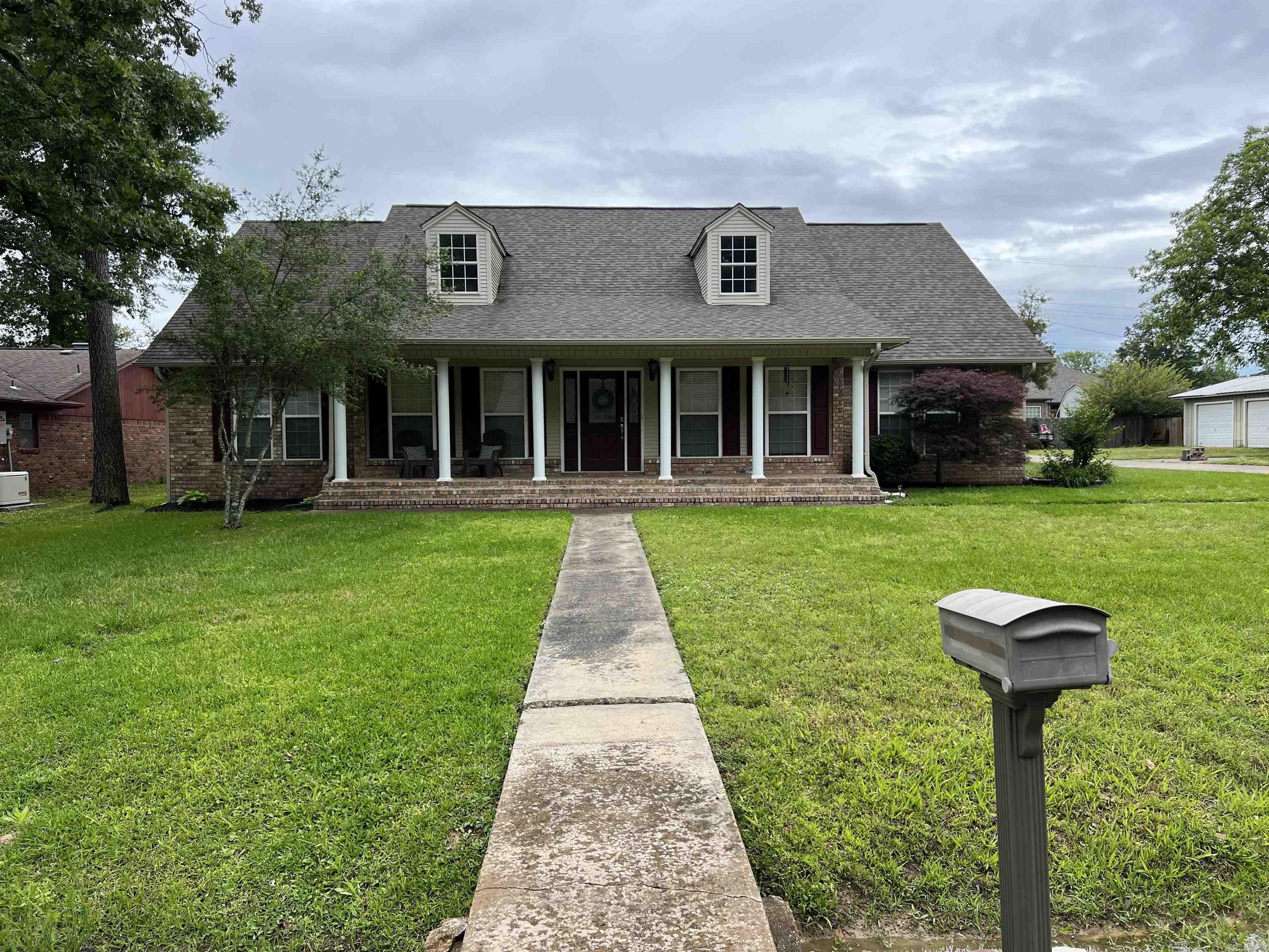 Welcome to this stunning custom-built 3-bedroom, 3-bath home that perfectly blends comfort, style, and functionality. Boasting an exceptional floor plan, this home has been thoughtfully updated throughout and is move-in ready. Recent upgrades include a newer roof, newer HVAC, and a brand-new water heater, ensuring peace of mind for years to come.Step into the spacious kitchen featuring new countertops, a modern backsplash, a large eat-in breakfast area, a kitchen bar, and a convenient office nook—ideal for remote work or homework time. Fresh interior paint throughout the home gives it a clean, modern look, and the large sunroom offers the perfect spot to relax in natural light all year round.he master bedroom is generously sized and includes a luxurious double vanity and double showers in the en-suite bath. Two additional bedrooms and full bathrooms provide plenty of room for family and guests. A full laundry room adds extra functionality to the home’s thoughtful layout.Enjoy outdoor living on the brand-new custom-built covered back patio or unwind on the charming front porch.his home is Rural Development eligible, making it an excellent opportunity for qualified buyers.