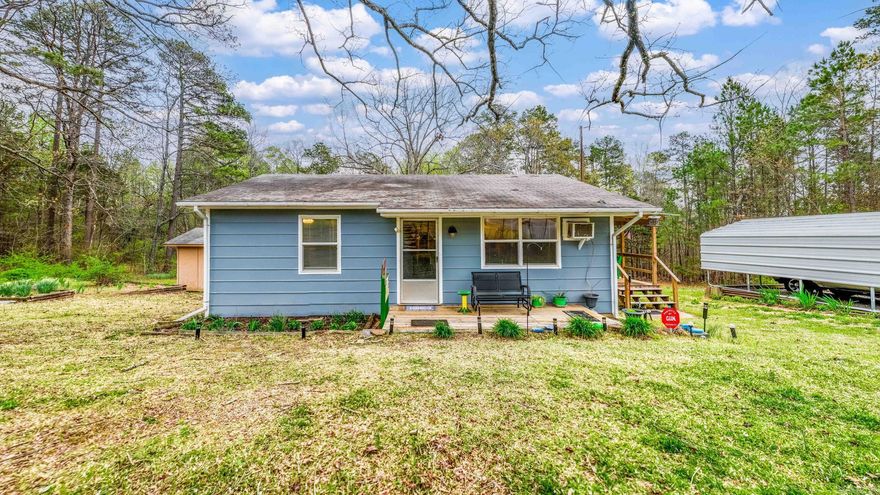 ADORABLE HOME ON ONE ACRE! Be sure to watch the video walkthrough! This 2 bed, 1 bath home is perfect for someone looking for their first house, a small family looking to downsize, or someone who wants a getaway close to the lake! As you approach the property, you'll be welcomed by all of the beautiful flowering trees and plants! The large, covered deck is perfect for enjoying the outdoors and your morning cup of coffee. You'll be surprised by how much storage there is! The kitchen features plenty of cabinets and an area for a table, as well as a pantry by the kitchen and other storage closets throughout the house. This home sits on one acre, has a carport for parking, a shop with electricity, and two other outdoor storage buildings in good condition! 10 minutes to Choctaw Recreation Area, 3 minutes to downtown Clinton, 5 minutes from the Arkansas Natural Bridge, and 5 minutes to Clinton Schools. Washer and dryer convey! The property disclosure and survey are on file for you to review.