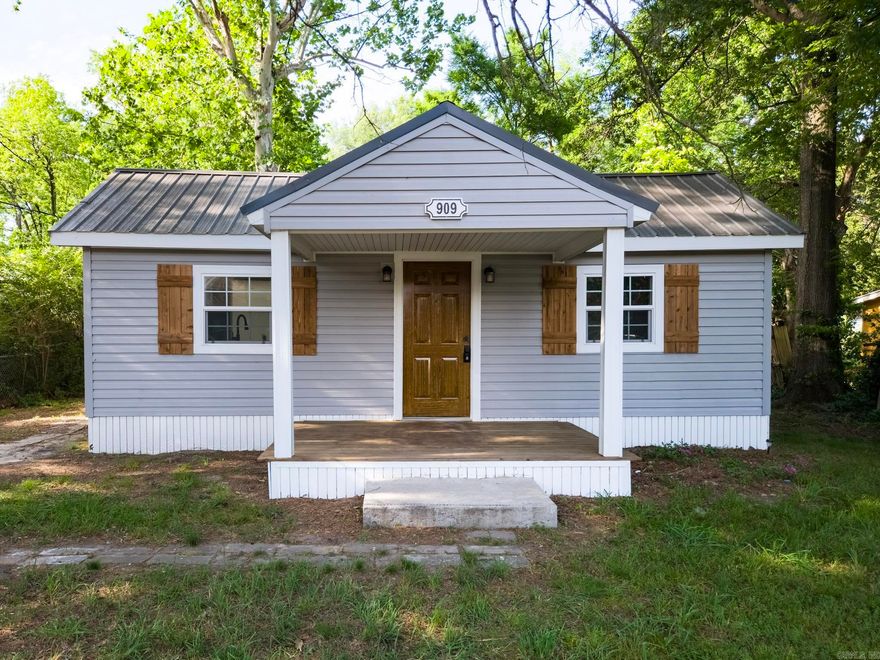 Perfect starter home in a low traffic quiet neighborhood. This fully remodeled home features two bedrooms, both with walk in closets and two full bathrooms. Find custom tile shower in the master ensuite bathroom, custom soft close wood cabinets and pot filler over the range area are added bonuses. Newly installed luxury vinyl plank flooring throughout and freshly stained front porch make maintaining your floor surfaces a breeze. High efficiency windows, mini split heat and air units and new attic insulation will help you keep your energy bills low year round in this all electric home. Long lasting metal roof and beautiful vinyl siding make your exterior elegant and low maintenance. Property also comes with a 10x12 (measurements approximate) storage building with new windows and city approval to build a mother in law suite in the back yard with access to the alley. Schedule your showing today before it's gone! Front door to be stained and interior pictures coming soon!