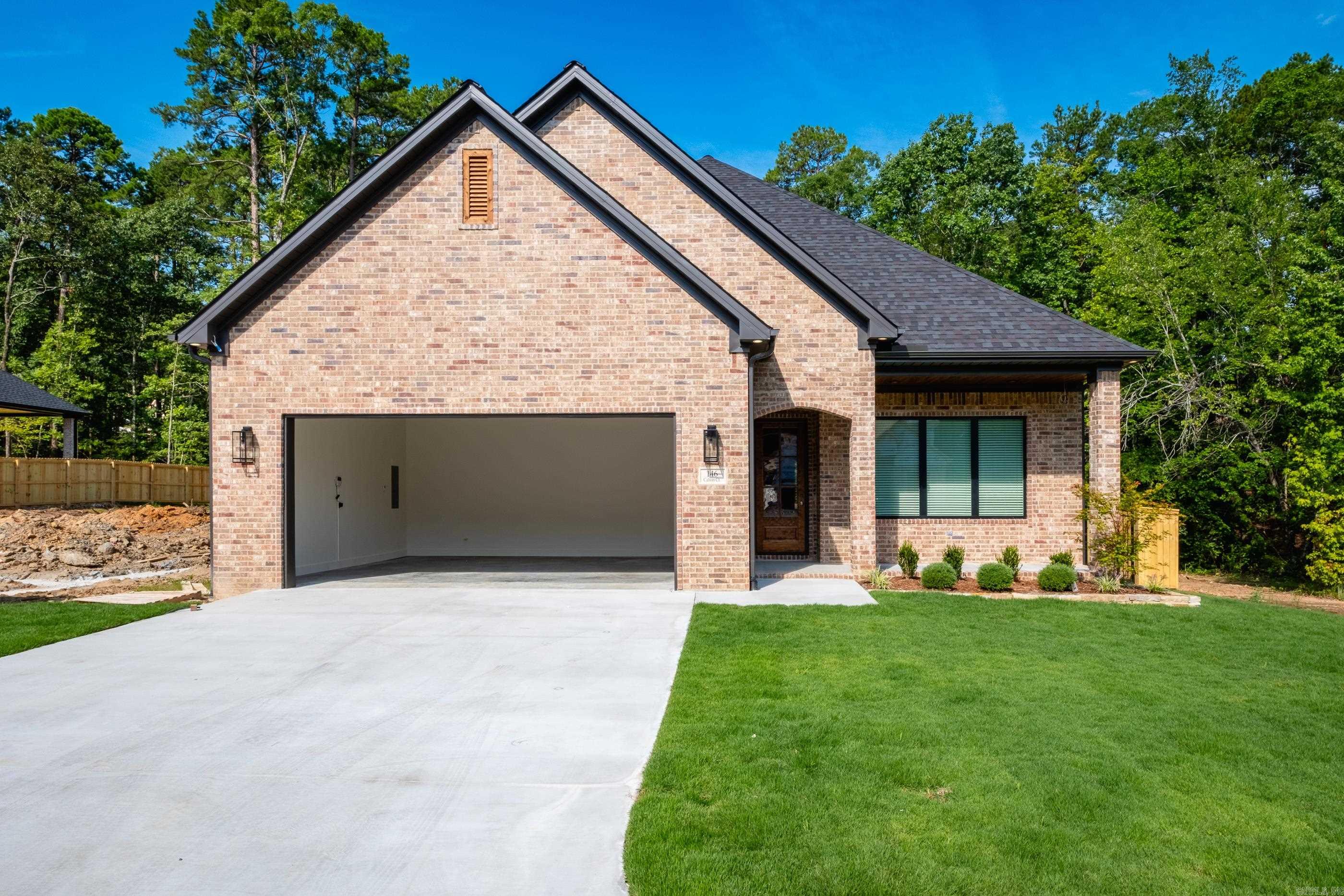 146 Calion Court in Chenal Valley is almost ready to call home! Enjoy this spacious open floor plan at the end of the cul de sac surrounded on three sides by greenbelts. The kitchen is gorgeous with upgraded countertops and appliances. The primary suite is outstanding with a spa bath and walk in closet. An additional bedroom with a full bath and walk-in closet is on the main level and two additional bedrooms with a full bath are upstairs. The covered patio is ready to hang the television and hook up the gas grill! Storage is amazing. Call today for a design board and an appointment.