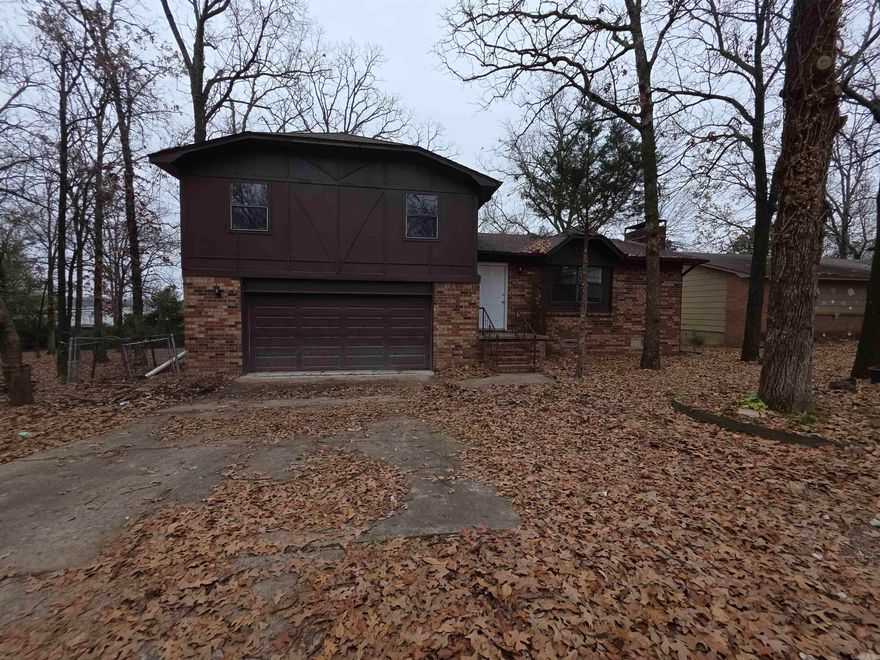 Welcome to your dream home! This beautifully updated split-level home features 3 spacious bedrooms and 2 modern bathrooms, perfect for families or roommates. Enjoy cooking in your stylish kitchen, complete with new countertops and ample storage. The kitchen and Dining room combination layout makes it perfect for entertaining guests or family gatherings. Each bedroom is designed for relaxation, offering plenty of natural light and closet space. The updated bathrooms feature modern fixtures and finishes, providing a serene space to unwind after a long day. Step outside to your private deck, ideal for summer barbecues or morning coffee. The fenced backyard offers a safe space for children and pets to play.  Located close to Sylvan Hills High School, shopping centers, and various amenities, this home is perfect for those who value convenience and community.