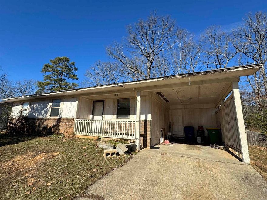 3 bed 1.5 bath, one level, single carport, covered porch, cool "she-shed" in back. BRAND NEW ARCHITECTURAL SHINGLES in December 2023 (previously had some roof leaks). Needs typical updating, painting, flooring, appliances, etc, but seems pretty solid. Established area, house backs up to woods on Camp Robinson. Recent foreclosure, not REO or bank owned. Local corporate owner can close quickly. Sold as is, no disclosure. SEE AGENT REMARKS for offer submission info.