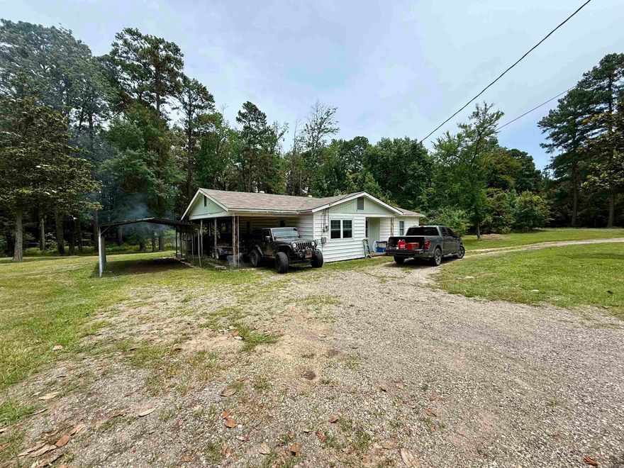 TWO HOMES | 2.67 ACRES | PRIME MT. HOLLY ROAD LOCATION *Property to be sold AS-IS WHERE-IS WITH ALL FAULTS  Opportunity awaits on this rare 2.67-acre property featuring two homes just outside of town on the highly sought-after Mt. Holly Road. The possibilities are endless—whether you're looking for a multi-generational setup, rental income, or space to renovate and customize to your liking.  Main Home: This 3-bedroom, 1.5-bath home offers a spacious layout with tons of potential. With a little TLC, this property can be transformed into a beautiful retreat. The layout makes it easy to convert the half bath into a second full bath, adding even more value.  Second Home: The second house on the property needs a bit more work but provides great bones and a blank canvas for your vision - ideal for a guest house, in-law suite, or potential rental income.  Enjoy the peaceful setting with room to spread out, garden, or build. Properties like this, with two homes and acreage in such a prime location, don’t come around often.  Don't miss your chance to invest, restore, and create something special!