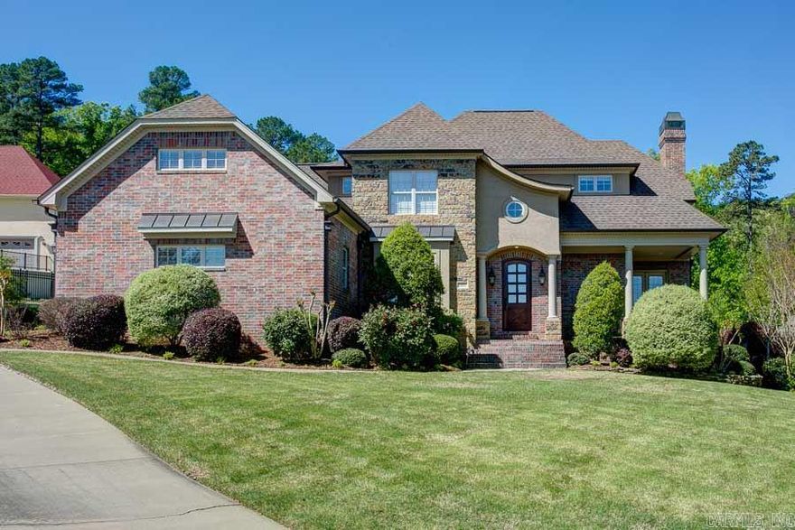 Wonderful Custom built home in The Courts! Chef's kitchen featuring gorgeous brick floors, Viking appliances, 6 burner gas range, a Cook's dream kitchen!! Beautiful hardwoods, stone fireplace, exposed wood beams, plantation shutters, butler's pantry, safe room are just a few of the amazing features of this home! Master suite has luxurious bath and huge closet. Upstairs are 3 bedrooms each having their own bathrooms with a bonus room that can be the fifth bedroom plus office!  Yard backs up to green space!!