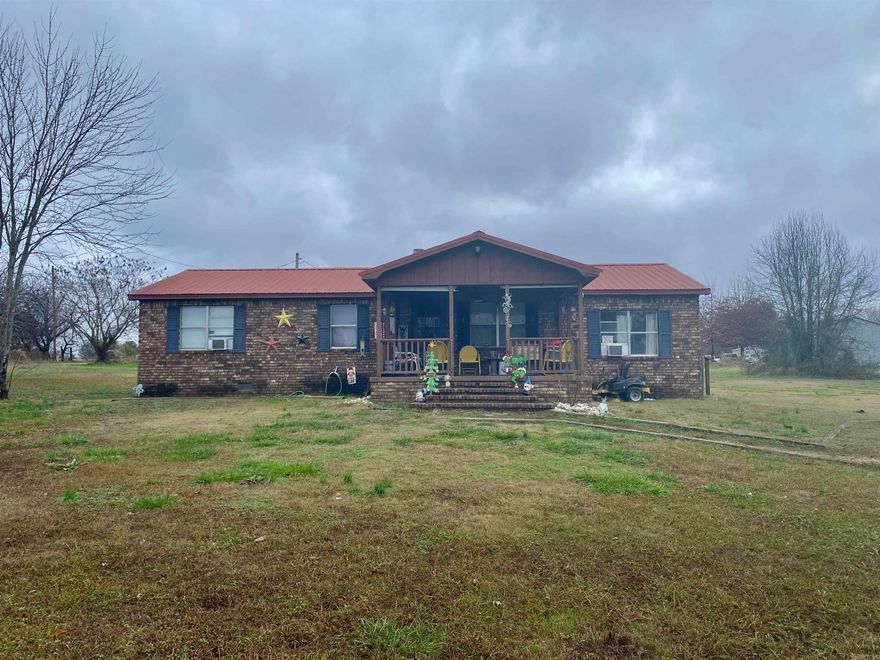 Charming 4-BR, 2.5-BA brick home located in the heart of Arkansas wine country near the Arkansas River! This semi-private property offers peaceful living with few neighbors and features a low-maintenance metal roof, a large covered front porch, and an all-electric design with a brand-new central air unit installed in 2023. Inside, you'll find a spacious laundry room and plenty of storage. An above-ground pool can convey with the property for added outdoor enjoyment. Nestled in a prime location, this home qualifies for the $0 down RD loan program, making it an excellent opportunity for affordable country living near local wineries and outdoor activities. Don’t miss your chance—schedule a showing today!