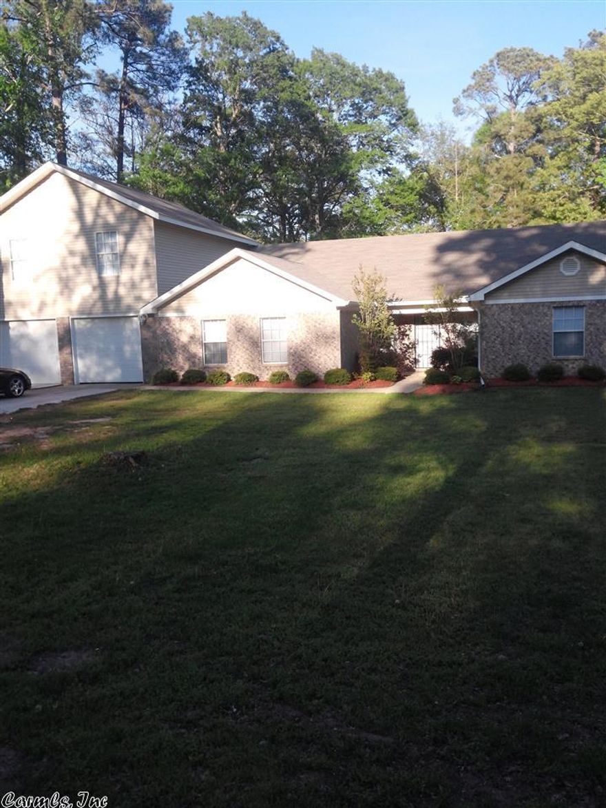 Expansive master suite on upper level with jetted hot tub, sitting area, walk-in closet and french doors to private patio. Downstairs Master features a bathroom and walk-in closet. Large game room for entertaining. Main living space has a open concept kitchen and spacious living room with patio door that leads to the backyard. Backyard features a huge deck perfect for cook-outs. Kitchen has a breakfast bar and wet bar with granite countertops. Easy access to freeway. Move in ready!