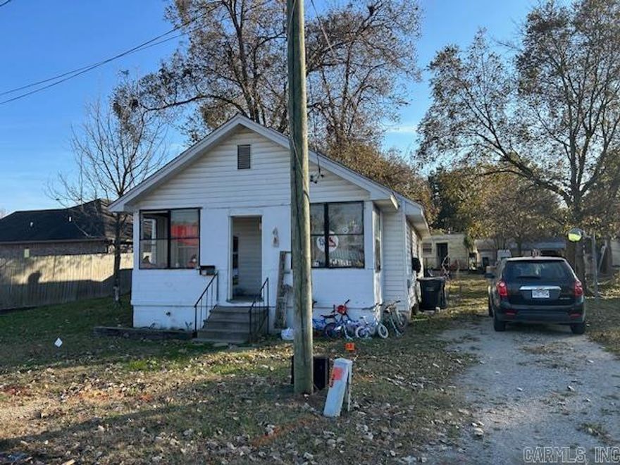 Great Investment Opportunity or Perfect Starter Home! Welcome to this charming 2-bedroom, 1-bath home located in the heart of Jonesboro. Sitting on a quiet street with convenient access to shopping, dining, and Arkansas State University, this property is ideal for investors, first-time home buyers, or anyone looking to add value through light updates. Inside, you'll find a functional floor plan with a comfortable living area, an eat-in kitchen, and two well-sized bedrooms. The home features a spacious backyard—perfect for pets, gardening, or future outdoor projects. With its affordable price point and strong rental potential, 823 Burke Ave offers excellent ROI for investors. For first-time buyers, it’s a fantastic opportunity to own a home for less than rent and begin building equity. Whether you're looking to expand your rental portfolio or take your first step into homeownership, this property delivers outstanding potential and value.