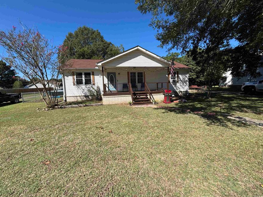 Welcome to 801 N Beech! This 3-bedroom, 2-bathroom home sits on a spacious half-acre lot, offering the perfect balance of comfort and functionality. Built in 1999, it features an innovative layout with a bright living area, dining space, and kitchen designed for easy everyday living. Custom cabinetry featuring wrought iron, and 100-year-old barn tin. Outside, enjoy a fully fenced backyard with a double gate for easy access. In addition to the two-car garage, this property features two Morgan storage buildings, ideal for storing tools, hobbies, or extra items. With its solid construction and new roof in 2022, this home is ready for new owners to make it their own. Schedule your private showing today!