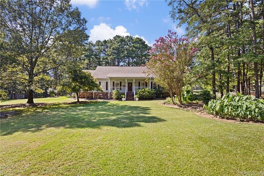 Welcome to this beautiful Southern-style home nestled in the highly desirable Cliff & Stream neighborhood. Situated on a generous 1.68 acre wooded and landscaped lot, this property offers privacy, space, and timeless charm. Featuring 2 bedrooms and 2 full bathrooms, this home included a luxurious master suite with a jetted tub and separate shower for your relaxation. Enjoy tall ceilings and crown molding, a cozy fireplace vented throughout the home, and gleaming hardwood floors in the kitchen and dining areas. The kitchen is a chef's delight with Corian countertops and ample cabinetry, perfect for entertaining or everyday living. A bright and inviting sunroom offers the perfect spot to unwind and enjoy views of the serene backyard. Don't miss this rare opportunity to own a stunning home with both comfort and character. (Ask for details on carpet/flooring allowance).