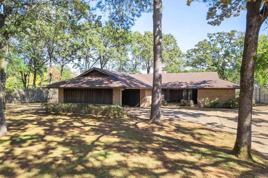 This one-of-a-kind home is located on a quiet cul-de-sac and features picturesque lake views along with a lakeside lifestyle on an expansive half-acre lot in the highly desirable Lakewood neighborhood of North Little Rock. This single-level home includes four bedrooms and three bathrooms and showcases mid-century modern architecture with beautiful tongue & groove paneling throughout. The vaulted ceiling and back wall of glass windows and doors create a seamless connection to the outdoors, offering panoramic views.  Living on the lake is made easy with a private in-ground pool and a dock. The home retains its original details while boasting a modestly remodeled kitchen equipped with new appliances, flooring, and Corian countertops.   Whether you’re looking for a lakeside retreat, a one-level home for aging in place, or a spacious environment to raise a family, this home could be the perfect fit for you. Schedule a showing today to seize this unique opportunity to own a lakefront property close to schools, churches, shops, and restaurants. (This house was built in 1972 and has been well-maintained, although it has not been renovated.)