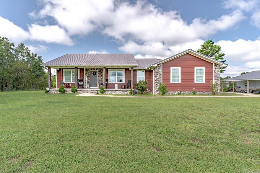 Welcome to Market 70 Dogwood Drive in Calico Rock! This home features over 1600 square ft of well laid out living space. This three bedroom two bathroom home was built in 2018 and every detail of this home was thoughtfully designed. As you walk up to the front porch you will spot the beautiful brick accents along with the hardy board siding and stained wood beams. Entering the living room you will notice the gas log fireplace, picturesque windows and vaulted ceiling. The kitchen is the main focus with custom cabinets, granite countertops and stainless steel appliances. The master bathroom features a shower and a large soaker tub, his and her sinks and mirrors. The home has a dual fuel furnace and a gas hot water heater. The home was engineered already wired and ready for your backup generator or camper hookup.  The 24x30 shop with lean-tos is insulated, has electric and is partially finished inside. The sprawling ten acres features cleared and wooded portions both. Call today to see this one before it’s gone!