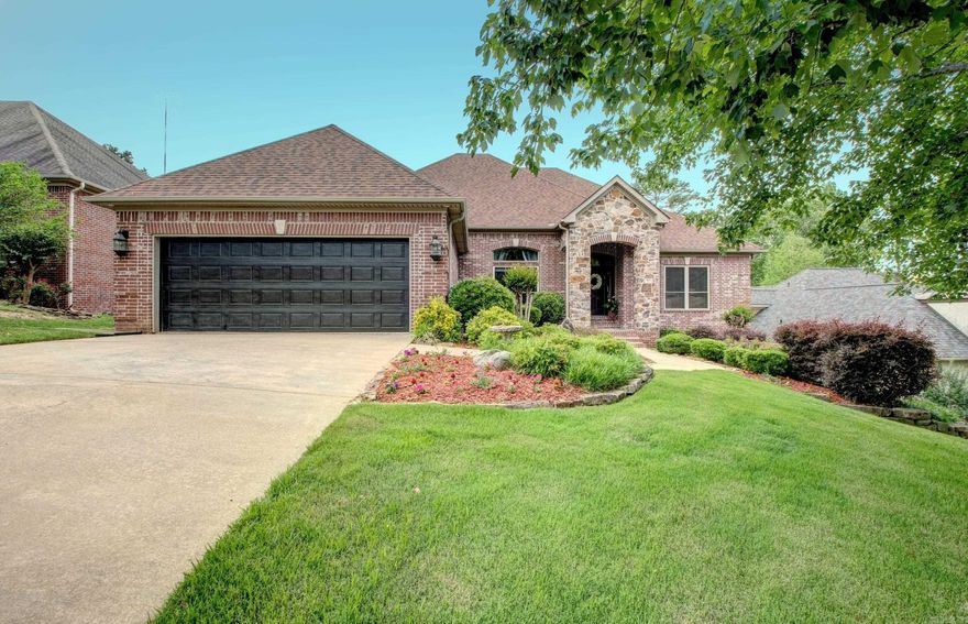 THIS ONE IS JUST BEAUTIFUL! A RARE PROPERTY ON A LARGE LOT WITH GREENBELT IN BACK!  So many wonderful details, updates and special touches have been added to this home.  You enter the foyer and it opens into the expansive living area and open dining.  The spacious kitchen is semi-open to the Great Room and has wonderful wall of windows overlooking the tranquil backyard.  Wonderful granite countertops, double ovens, gas cooktop and great storage. The Primary Suite is separate of two other bedrooms on the main level.  Beautiful staircase leads you downstairs into a wonderful bonus/media area and two more spacious bedrooms, with large closets, and one full bath with dual vanities.  NEW ROOF 4 years ago;  Both HVAC (Trane units) replaced 3 years ago.  EXPANSIVE concrete floored storage off bonus area downstairs that leads outside thru garage door access.  Upper and lower covered patio areas are just wonderful and overlook that beautiful yard and greenbelt space behind.  You will love enjoying the outside of this home as much as the inside!  COME & SEE FOR YOURSELF!