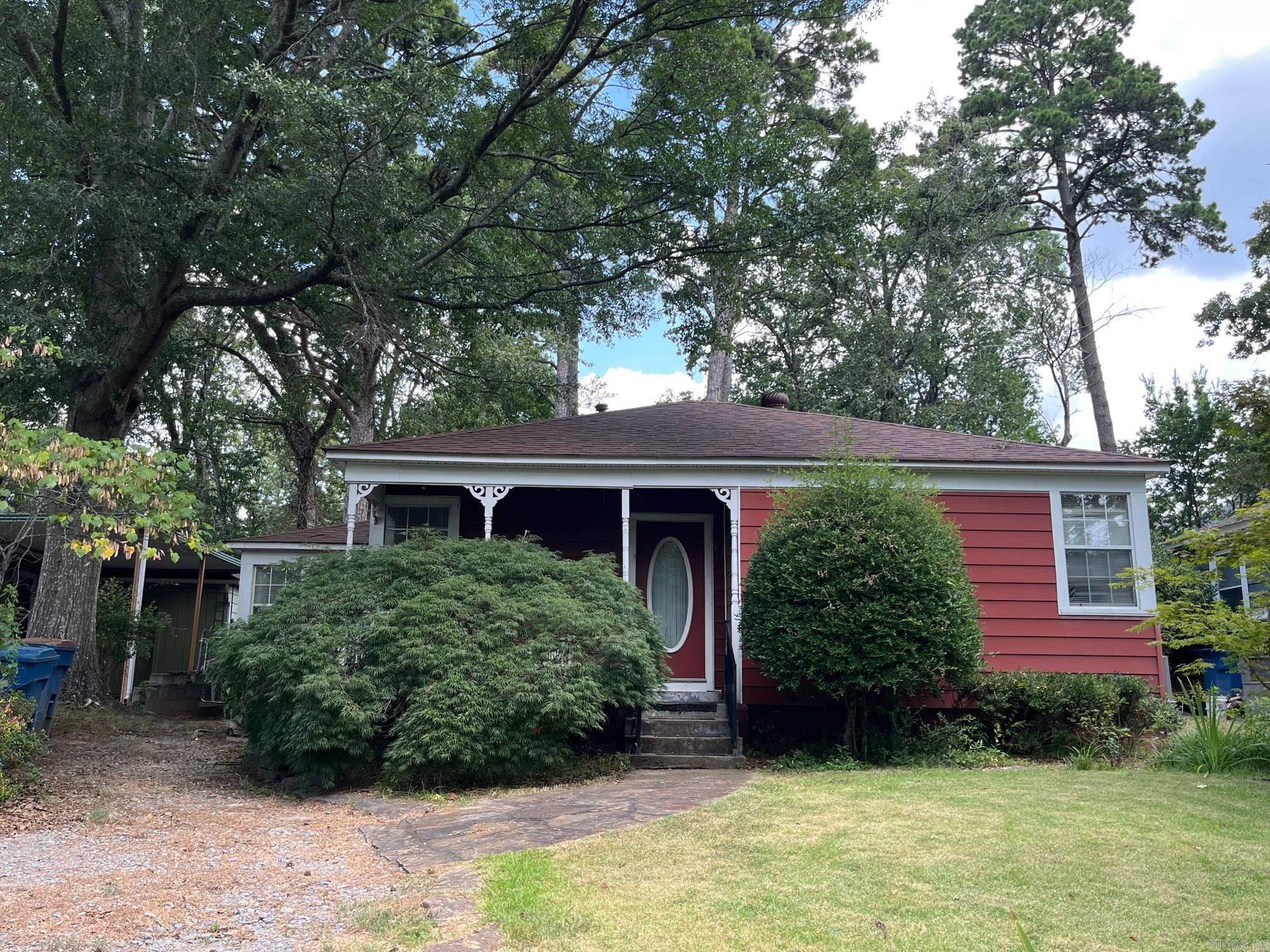 Must see this Cammack Village cottage with an open front porch situated on a beautiful tree laden lot. Across from Cammack Woods and convenient to Kavanaugh in the heights with great shopping and restaurants. The home has beautiful old Heights style with corner windows and hardwood floors. Features a nice den which opens into the kitchen area. Den can be enclosed as a third bedroom or expand into the laundry room in the back. French doors open into a screened in porch to sit and enjoy the feel of nature all around you. Back yard can be a gardeners paradise on a large lot. Hurry. Won't last!