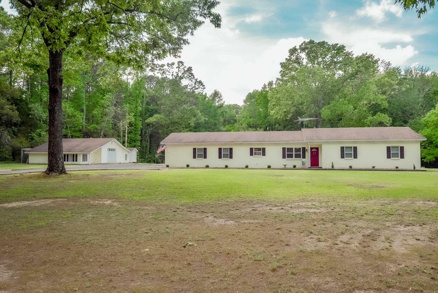 Country living at its finest—just minutes from Cabot city limits! This beautiful 3.88-acre property offers the perfect blend of peaceful surroundings and everyday convenience. The home features an updated kitchen with stunning cabinetry, double oven and a stylish backsplash. Dishwasher and microwave is less then a year old. Along with new windows throughout that bring in plenty of natural light.  Enjoy the bonus sunroom located just off the kitchen and dining area, providing easy access to the patio—ideal for entertaining guests or enjoying a quiet evening outdoors. The partially fenced backyard offers plenty of space for animals, gardening, or simply soaking in the wide-open space. Vinyl fencing along with chain-link fence. A shop adds extra functionality, making this property as practical as it is charming. Make note that the attached garage is heated and cooled.