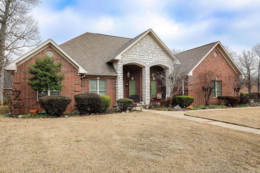 Classic one owner home in the heart of Hurricane Lake! This custom built home will wow you with the extensive elegant crown moulding throughout the home, and arched door openings for more elegance! Add this double trey ceiling with stepped crown in the formal dining room and you are ready to entertain! Separate primary suite is spacious both in bedroom and bath, offering you a large jacuzzi tub, large walk-in shower and large closet, with access through to the convenient laundry room. Kitchen features an eat in breakfast room, large bar for big families, granite and corian countertops, double oven, pantry with 10 pullout drawers and plenty of counter and cabinet space for your cooking needs. Great room has a wall of cabinets surrounding the adorned gas fireplace. Bedrooms 2 & 3 with crown moulding and walk-in closets. This home also features an office with dbl doors for work or play.  Small private backyard has a covered patio and a screened in porch! Big side yard and front yard on this corner lot location, convenient to HL POA facilities! Hurry, this home has lots to offer you!