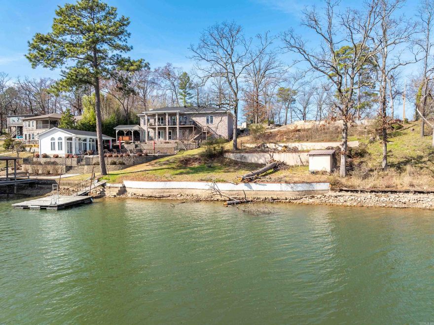 Location, Location, Location, Year round water! NO POA! Great neighborhood! Gorgeous view, Ready for you to build your dream home! City utilities available, sea wall in place, swim dock, boat dock permit, and survey. Seller has blueprints if interested. Ten minutes to all amenities that beautiful Hot Springs has to offer! Lakeside Schools!