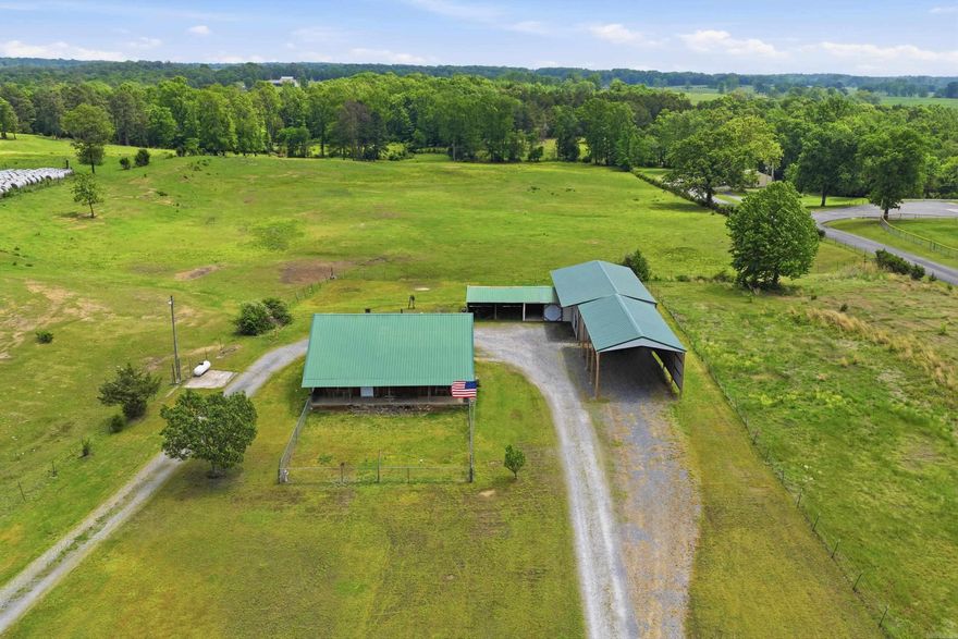 Live where the music plays! This 1,486 sq ft, 3-bedroom, 3-bath home sits on 1.2 beautiful acres right next to the city park—home to summer concerts, playgrounds, and year-round community fun. NEW CENTRAL H/A JUST ADDED 11-17-2025 Kitchen appliances, washer, & dryer stay.  Bring all your toys—there’s a 25x50 shop with 2 Overhead Garage Doors , plus a massive 23x45 covered carport with 15ft. Clearance & 50-amp service for your RV, boat, or extra vehicles. Inside, you’ll find a comfortable layout with Main Floor having guest bedroom & hallway Guest Bathroom, as well as Primary Bedroom having walk-in shower & Soaking Tub (both recently remodeled). Upstairs has another Large Bedroom (could be used as a Secondary Primary Bedroom) including Large walk-in Tiled shower with walk in closet.  Outside space to garden, play, or just relax under the stars. Whether you’re looking for a vacation retreat, full-time home, or investment property, this one checks every box. (Survey has not been done yet on property, so Tax Assessor drawing of land is not correct).  View Virtual Tour Video Below in details.  By appointment only.