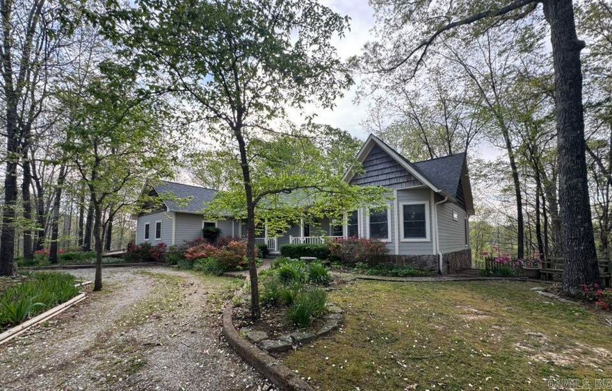 Tucked away in a peaceful, wooded setting just minutes from downtown Mountain View, this spacious 3,865 sq ft home offers the perfect blend of privacy, comfort, and versatility on 16 mostly wooded acres. With paved driveways and a welcoming country feel, the property is ideal for those seeking space to spread out while staying close to town. The main level of the home features 2 large bedrooms and 2 full baths, a utility room, and a cozy office or reading room. The heart of the home is a generous open living area perfect for gathering, and the layout offers plenty of room for entertaining or relaxing. Downstairs, the fully livable walk-out basement includes a private bedroom and bath, with both interior and exterior access for added convenience. An attached two-car garage ensures easy access and storage. Outside, a large, detached shop with dual garage doors provides endless opportunities for hobbies, storage, or a workshop. An additional one-car detached garage includes a small apartment-style space complete with a half bath—great for guests or a home office setup. The home also includes a whole-house generator for added peace of mind.
