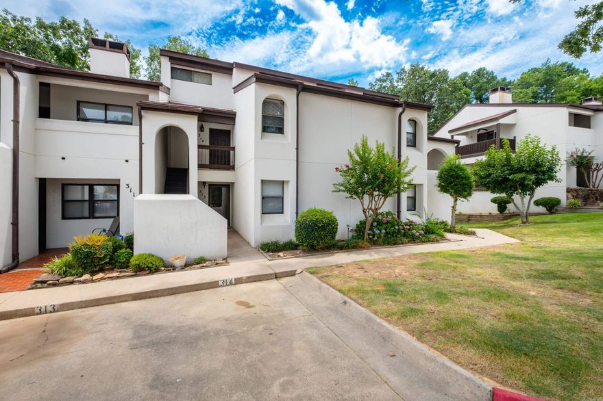 Updated 2-Bedroom/2-bath Condo Backing up to Greenspace – Move-In Ready! This beautifully updated condo offers style, comfort, and a highly convenient location. Relax and unwind in the living room with tall ceilings, a cozy, wood burning fireplace and recently renovated to uniquely open up  to the kitchen and dining areas. The kitchen now boasts sleek, Swedish soft-close cabinets, granite countertops, and modern appliances. The downstairs bathroom has also been partially renovated for a fresh, updated feel. New flooring throughout the downstairs, new HVAC (2022), and washer, dryer, refrigerator to convey for an added bonus. Step outside to your private balcony overlooking peaceful greenspace or grab a towel and head down to the pool- just move in and enjoy! See agent remarks.