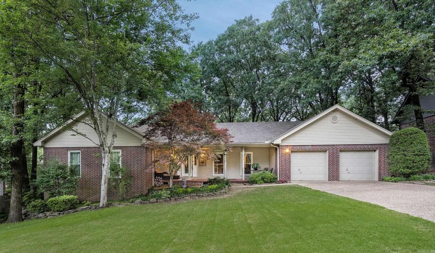 Welcome to your one-level retreat in a charming, tree-lined neighborhood! This beautifully updated 4-bedroom, 2.5-bath home features brand-new luxury vinyl plank flooring and fresh paint throughout. The spacious layout includes a large living room with a cozy fireplace that flows seamlessly into a sunroom surrounded by windows—with 240 bonus sq ft not included in total square footage.  The kitchen is a dream: granite countertops, walk-in pantry, and tons of cabinet space make it perfect for everyday living and weekend hosting. The oversized primary suite offers a spa-like bath with soaking tub, separate shower, and double vanity. Secondary bedrooms provide flexible space for guests, hobbies, or work-from-home needs.  Out back, you’ll love the shady, fully fenced yard with a screened porch and a deck—ideal for grilling, relaxing, or simply enjoying the quiet. Located minutes from top-rated schools, parks, shopping, and major highways, this home blends comfort and convenience with long-term livability.