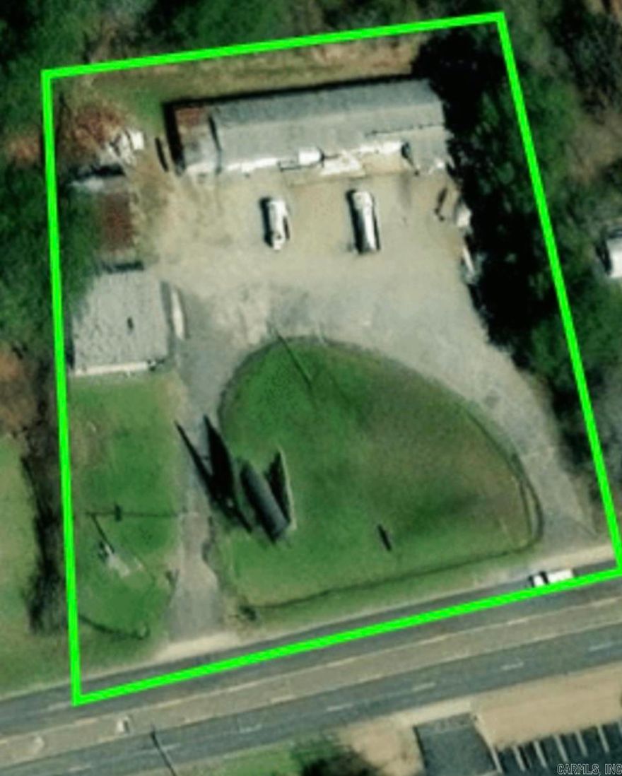Possibilities are endless. Traffic count 22,000 plus per day. Large shop 135' by 30' 3 Large overhead doors with high ceiling concrete floor. 1/2 bath with small office. 2nd building is 46'x36' with bathroom breakroom and 4 separate offices with large reception area.