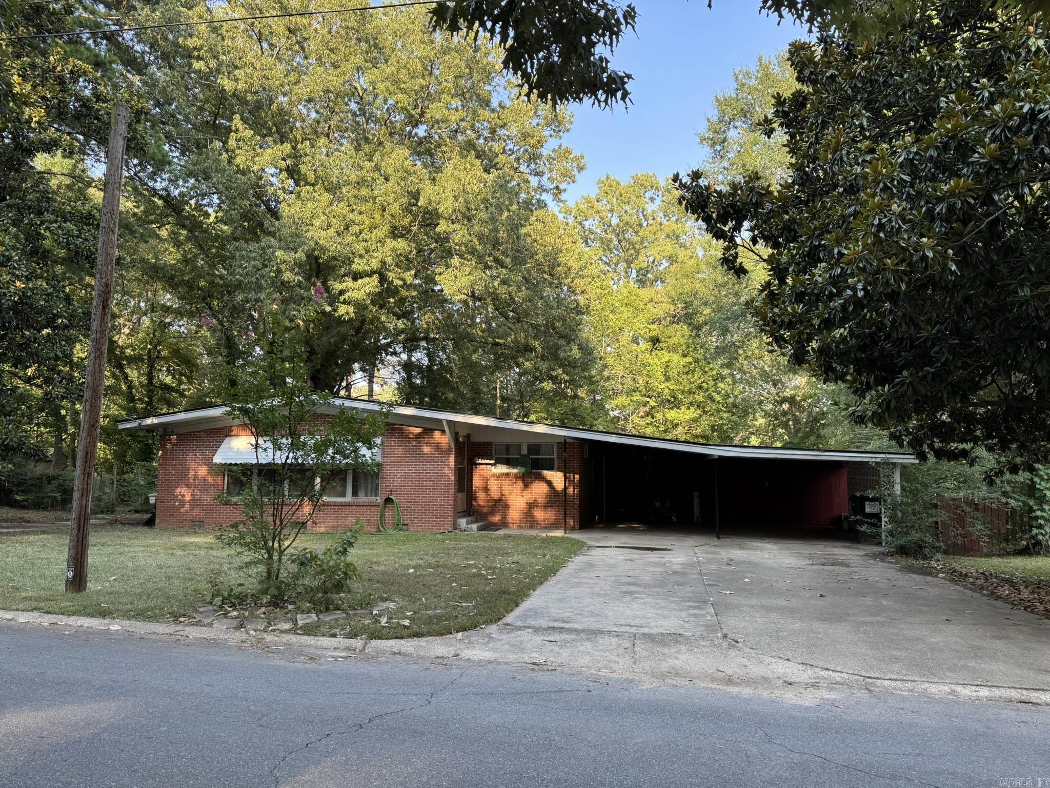Charming 3 Bedroom 1 Bath home located in a wonderful neighborhood, great for riding bikes and being outside! This home has 3 living areas plus a covered patio in the back yard which is all great for entertaining! Do you have a boat or an RV? Well, there is a parking pad already there for that extra toy that you have! New roof, New AC, newer oven and microwave and new lighting in part of the house! This house is such a good floor plan, the primary bedroom is huge! Take a look at this home that is a great square footage buy!