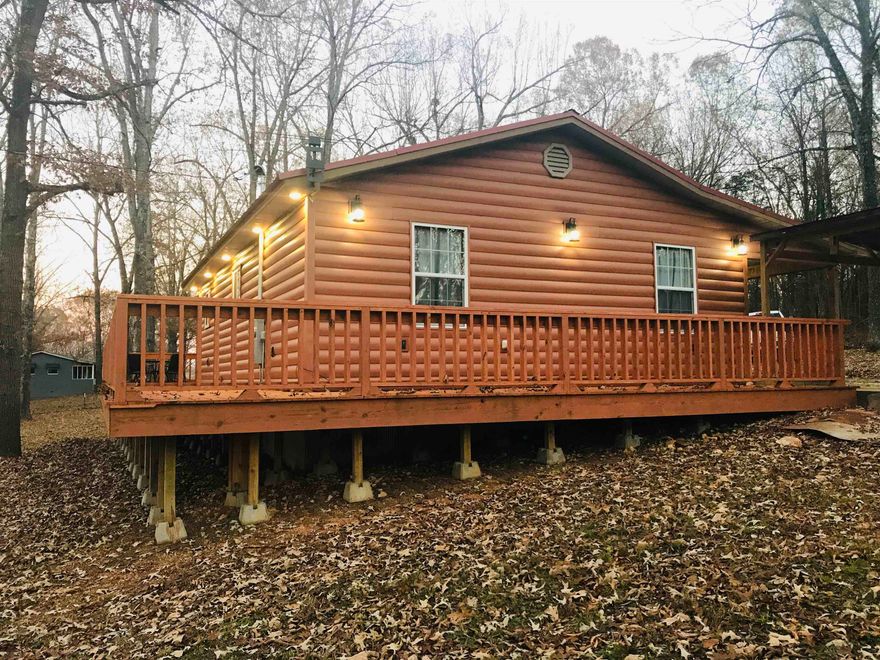 Escape to your dream countryside retreat with this newly renovated 2-bedroom, 1.5 bath cabin, nestled on a serene corner lot just a short stroll from the pristine Spring River. Perfect as a cozy permanent residence or a tranquil weekend getaway, this charming country cabin blends modern upgrades with rustic charm. Step inside to discover a move-in ready, fully updated and furnished interior featuring brand-new kitchen appliances, a new water softener, and a new water heater for worry-free living. Outside, a stunning new wrap-around deck invites you to sip morning coffee or host evening gatherings under the stars. Adventure awaits just steps away at the Spring River, with a convenient canoe or kayak launch area perfect for fishing, paddling, or simply enjoying natureās beauty. The property also includes a storage shed for all your outdoor gear or equipment. Donāt miss this chance to own this gem - schedule your tour today!