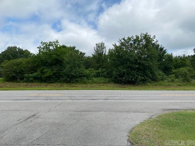 Utilities are at the highway. Property has two entrances and the third entrance backs up to Westwinds Subdivision. Acreage is all wooded. Acreage would be a great opportunity for development.