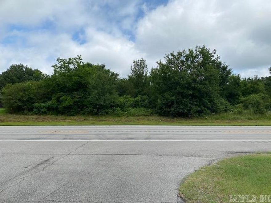 PRICE REDUCED Utilities are at the highway. Property has two entrances. Acreage is all wooded. Acreage would be a great opportunity for development.