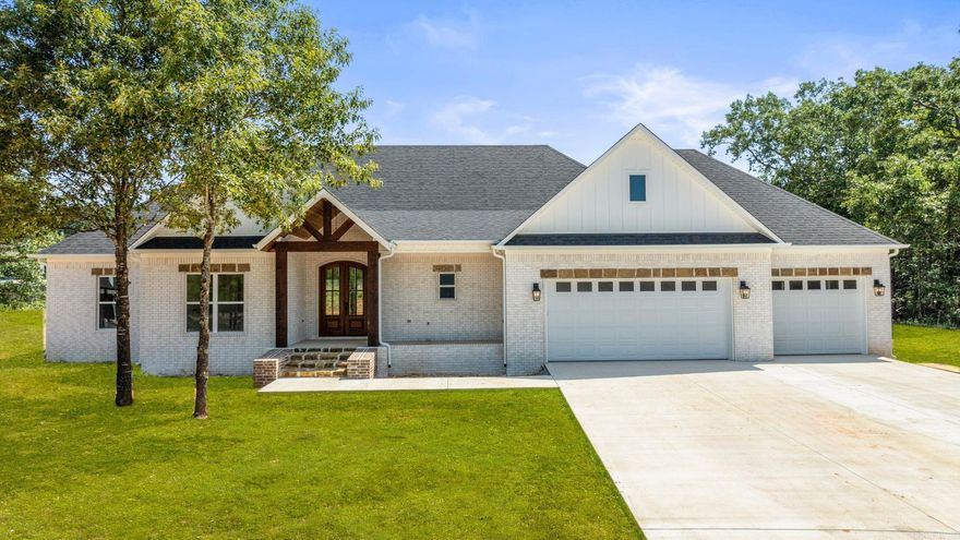 This floor plan is perfect. 4th bedroom is at the front of the house and would also make a great office. Vaulted ceiling in the living room with a wood beam. Electric fireplace with brick and shiplap. Kitchen has all the extras, huge hidden pantry, lots of storage with drawers for spices and utensils. Large laundry with a sink and walks through to the master closet. Separate tile shower with soaking tub. 1/2 bath as you enter from the garage. No carpet. Jack and Jill bathrooms between the spare bedrooms with a door to the hallway as well. All of this on an acre lot. Don't forget the large back porch with vaulted wood ceiling. Wood under the front porch ceiling as well. High speed fiber internet available!