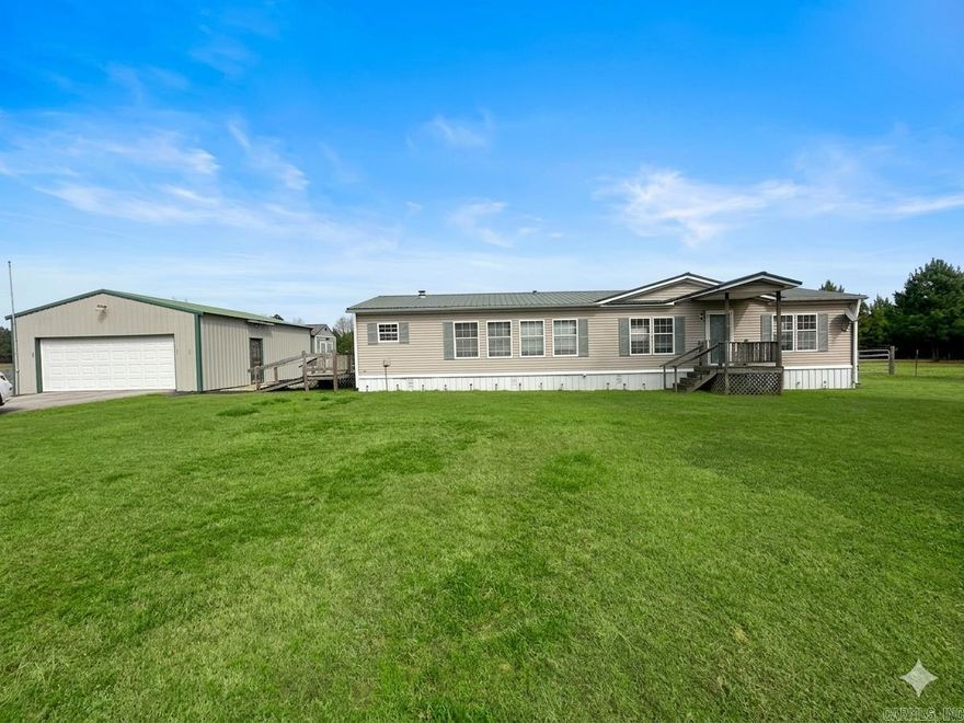 Peaceful country living with convenience! This 3 bedroom, 2 bathroom manufactured home on permanent foundation sits on 2.20 acres at the end of a quiet dead-end road offering privacy and space. Features include a split floor plan, large living area with gas fireplace, updated luxury vinyl flooring, a 2-car garage, large shed, and a shop—perfect for hobbies or storage. No restrictions so bring your animals, boats, or RVs. Great location for an easy commute while still enjoying a country setting. Hvac is approximately 1 year old and septic was pumped 1 year ago.