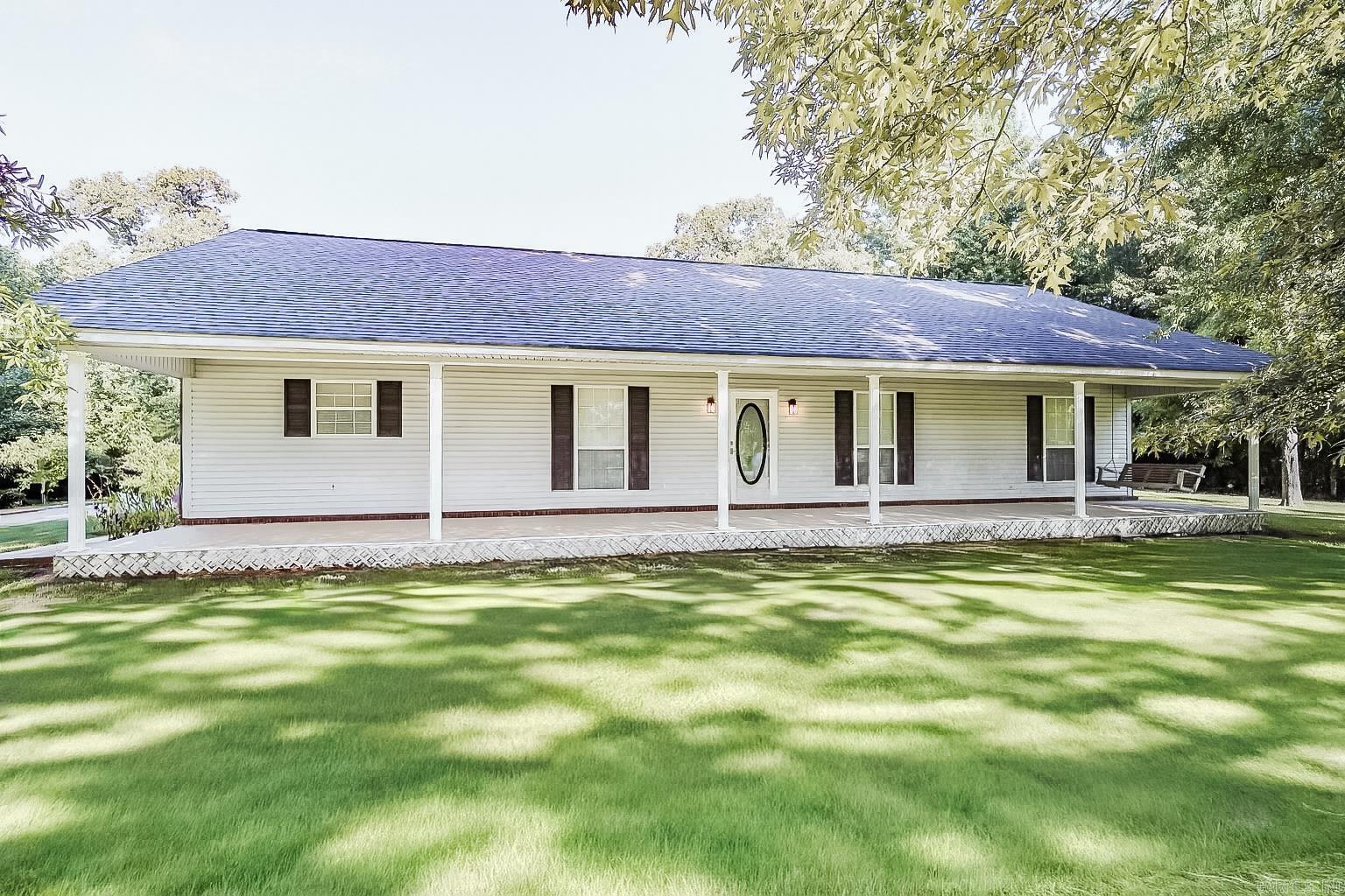 Spacious 3-bedroom, 2.5-bath home on 5.13+/- acres offering both comfort and functionality. Built in 1997, this well-kept property is equipped with underground electric, a whole-house 20KW Kohler generator, central vacuum system, and large closets for ample storage. A concrete driveway leads to the home, while a variety of outbuildings provide endless possibilities for equipment, hobbies, or workspace. These include a 15x26 lean-to barn, 14x26 lean-to barn, 25x30 pole shed, 24x26 utility building, and a 21x5 storage area. The layout of the property is designed for convenience, with plenty of room for organization and use of outdoor space. Located just 4 miles from the Highway 27 Fishing Village and minutes from town, this property combines a practical setup with a great location, making it well-suited for a variety of uses.