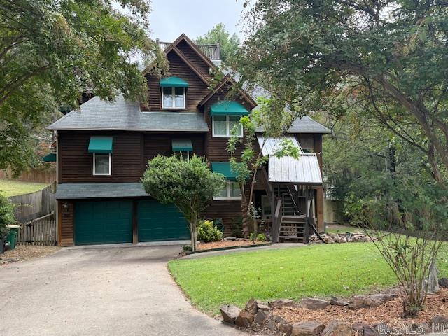 Sherwood Location! Remodeled 5 bedroom, 4 full baths located in a cul-du-sac. The kitchen opens up to a large living area with a rock fireplace. In addition to the bedrooms, there is a nice office on the ground floor. The exterior is cedar with green canopy awnings. The patio opens up to a large tree shaded back yard. Entire back yard is enclosed with wooden fencing for privacy. The yard has been recently landscaped. You will feel like you are living in the country right in Sherwood.