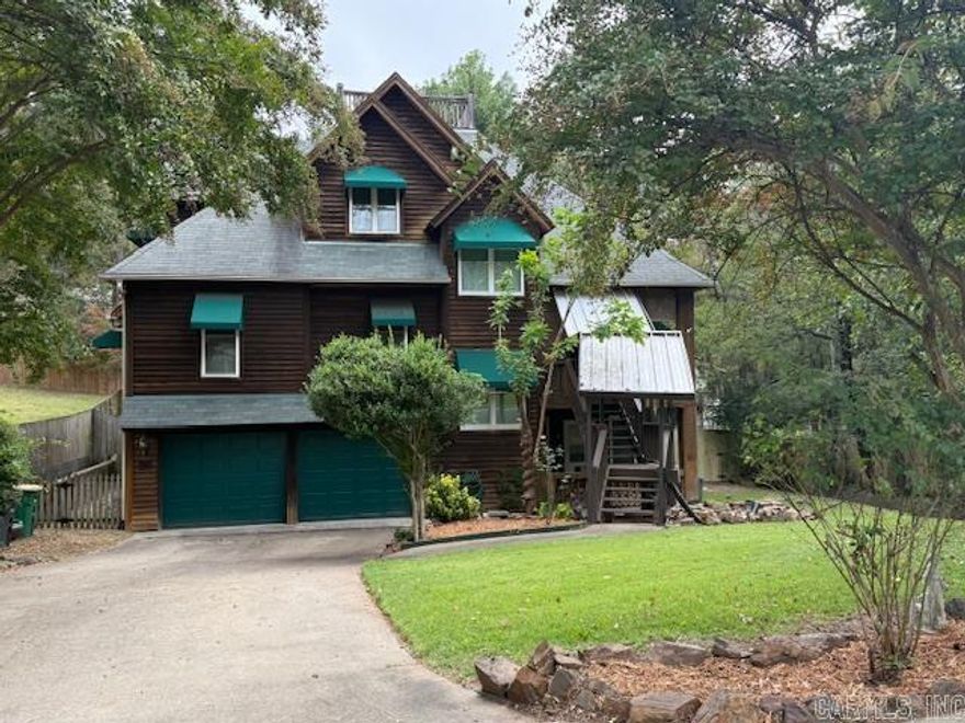 Sherwood Location! Remodeled 5 bedroom, 4 full baths located in a cul-du-sac.  The kitchen opens up to a large living area with a rock fireplace. In addition to the bedrooms, there is a nice office on the ground floor. The exterior is cedar with green canopy awnings. The patio opens up to a large tree shaded back yard. Entire back yard is enclosed with wooden fencing for privacy. The yard has been recently landscaped. You will feel like you are living in the country right in Sherwood.