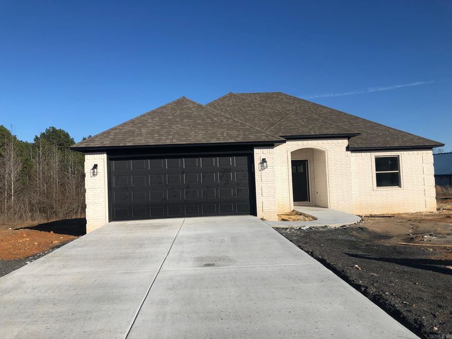 New waterfront home close to LRFAB. spacious open floorplan, unique main bath with separate vanities, and  2 big walk in closets,    Modern design with electric fireplace and lots of natural light from all windows facing lake Covered patio overlooking water.  10 year structural warranty