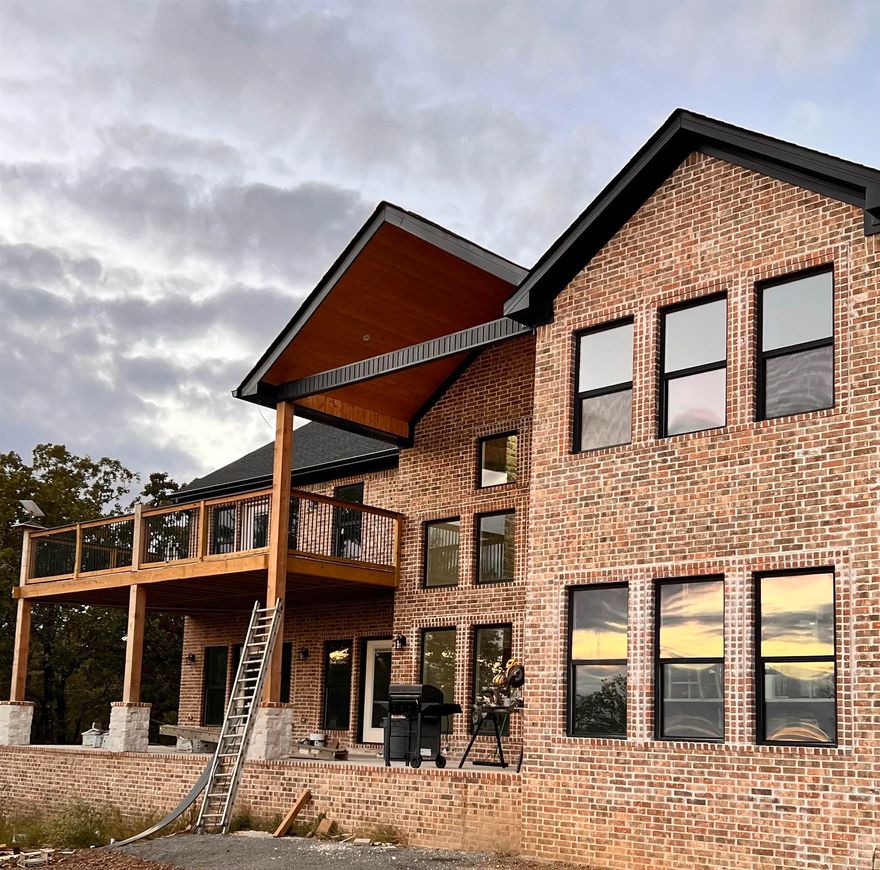 This custom-built new construction home in a gated community is a grand 5400 square feet of luxurious living space, set on a sprawling 4.85-acre estate, offering a truly incredible and breathtaking view. With 6 generously sized bedrooms and 5 elegantly designed bathrooms, this property exudes both opulence and functionality. The home also includes a full in-law quarters above the four car garage. This beautiful home was truly built with the intention of being a dream home but have unfortunately been relocated!   Currently under construction with opportunity to customize the remaining features over the next couple weeks with estimated completion date of December 15th, 2023!  Measuring encouraged.